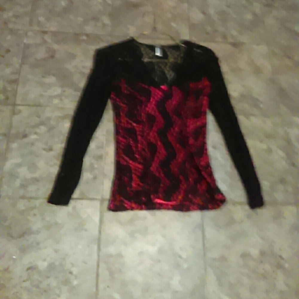 Low v neck full laced long sleeve shirt.